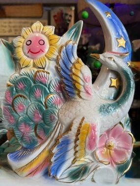 Colorful Ceramic Swan Figurine with Sun and Moon Motif